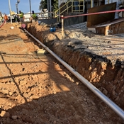 Tie-in piping laying in the ground at a wastewater treatment plant